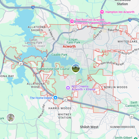 A localized street map with a red boundary line highlighting the area of Acworth, Georgia.
