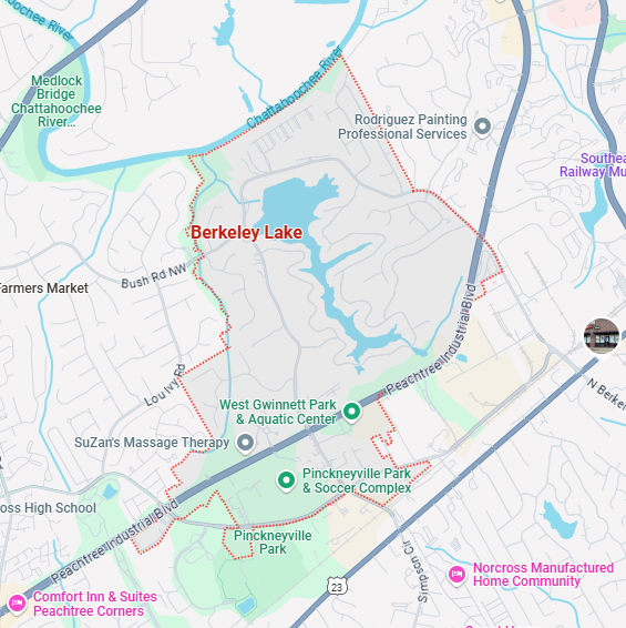 A localized street map with a red boundary line highlighting the area of Berkeley-Lake, Georgia.