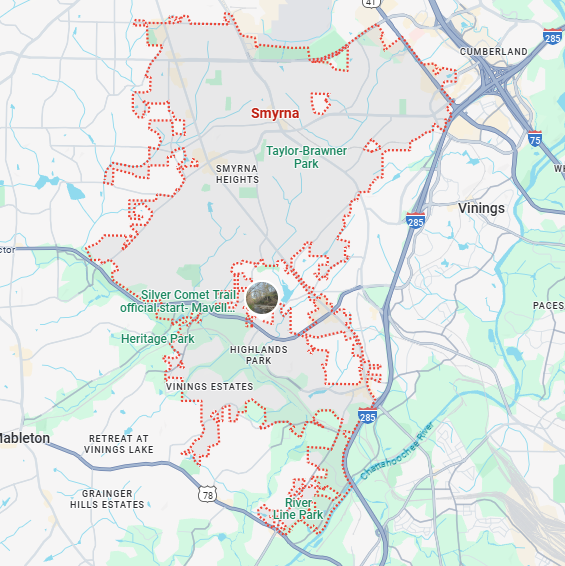 A localized street map with a red boundary line highlighting the area of Smyrna, Georgia.