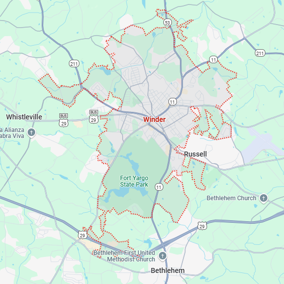 A localized street map with a red boundary line highlighting the area of Winder, Georgia.